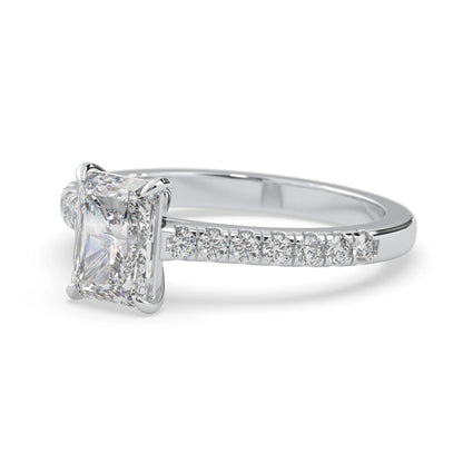 radiant cut lab grown diamond prong set engagement ring with pavé band and white gold metal tone design