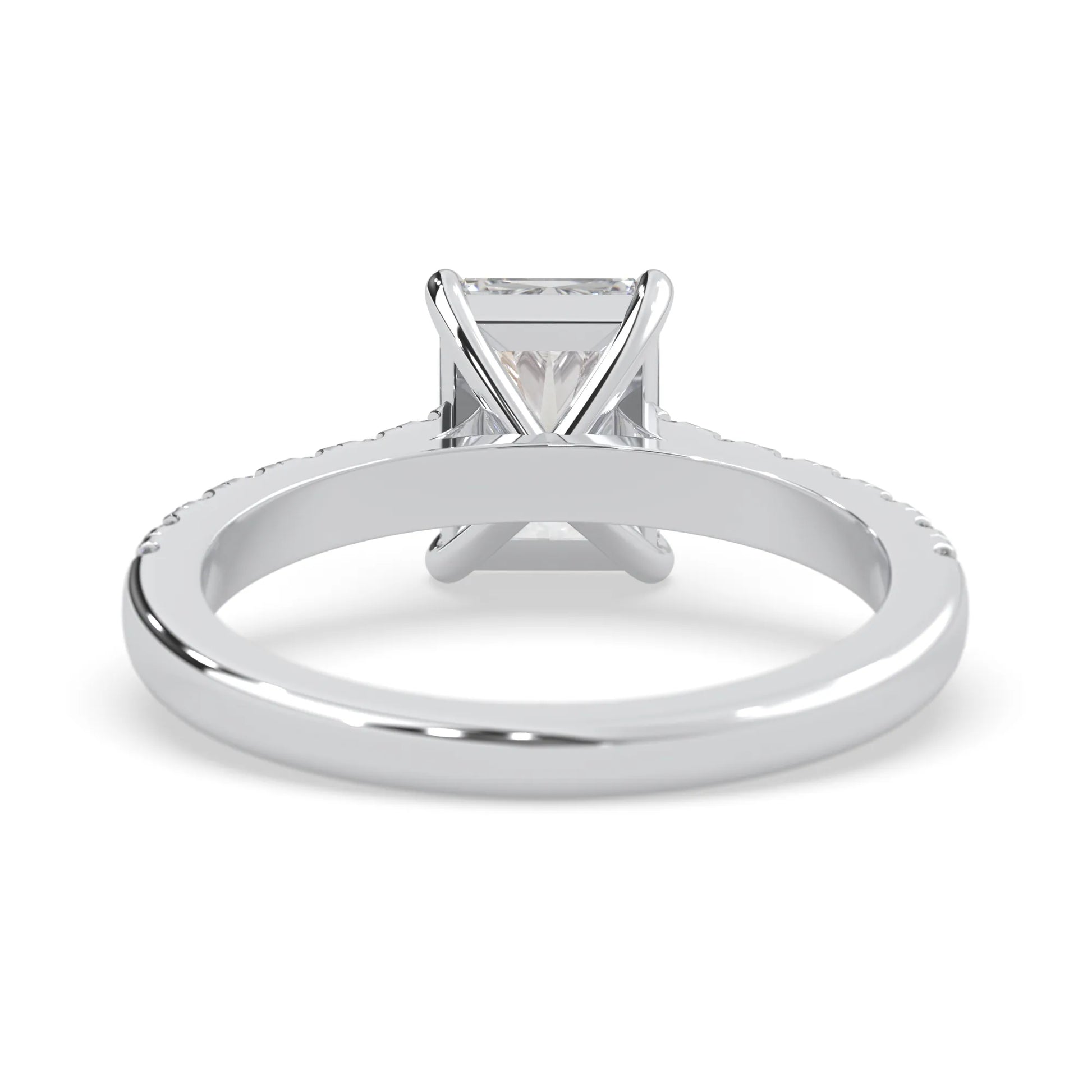 radiant cut lab grown diamond prong set engagement ring with pavé band and white gold metal tone design