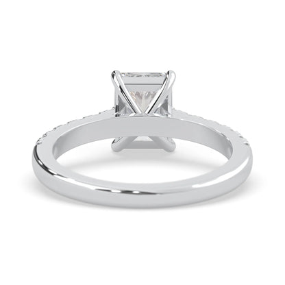 radiant cut lab grown diamond prong set engagement ring with pavé band and white gold metal tone design