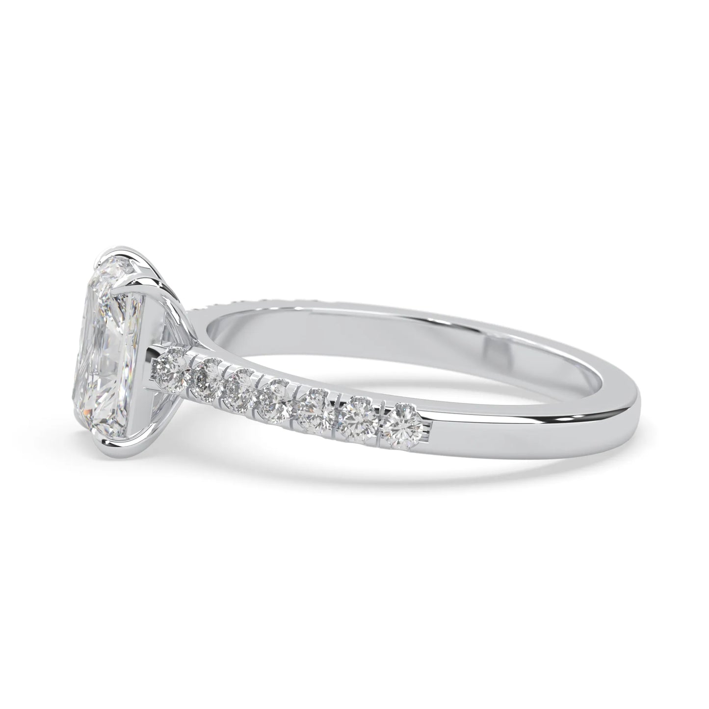 radiant cut lab grown diamond prong set engagement ring with pavé band and white gold metal tone design