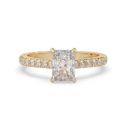 radiant cut lab grown diamond prong set engagement ring with pavé band and yellow gold metal tone design