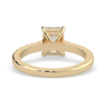 radiant cut lab grown diamond prong set engagement ring with pavé band and yellow gold metal tone design