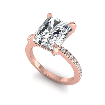 Radiant cut lab grown diamond solitaire engagement ring with hidden halo, pavé band, and rose gold metal tone.