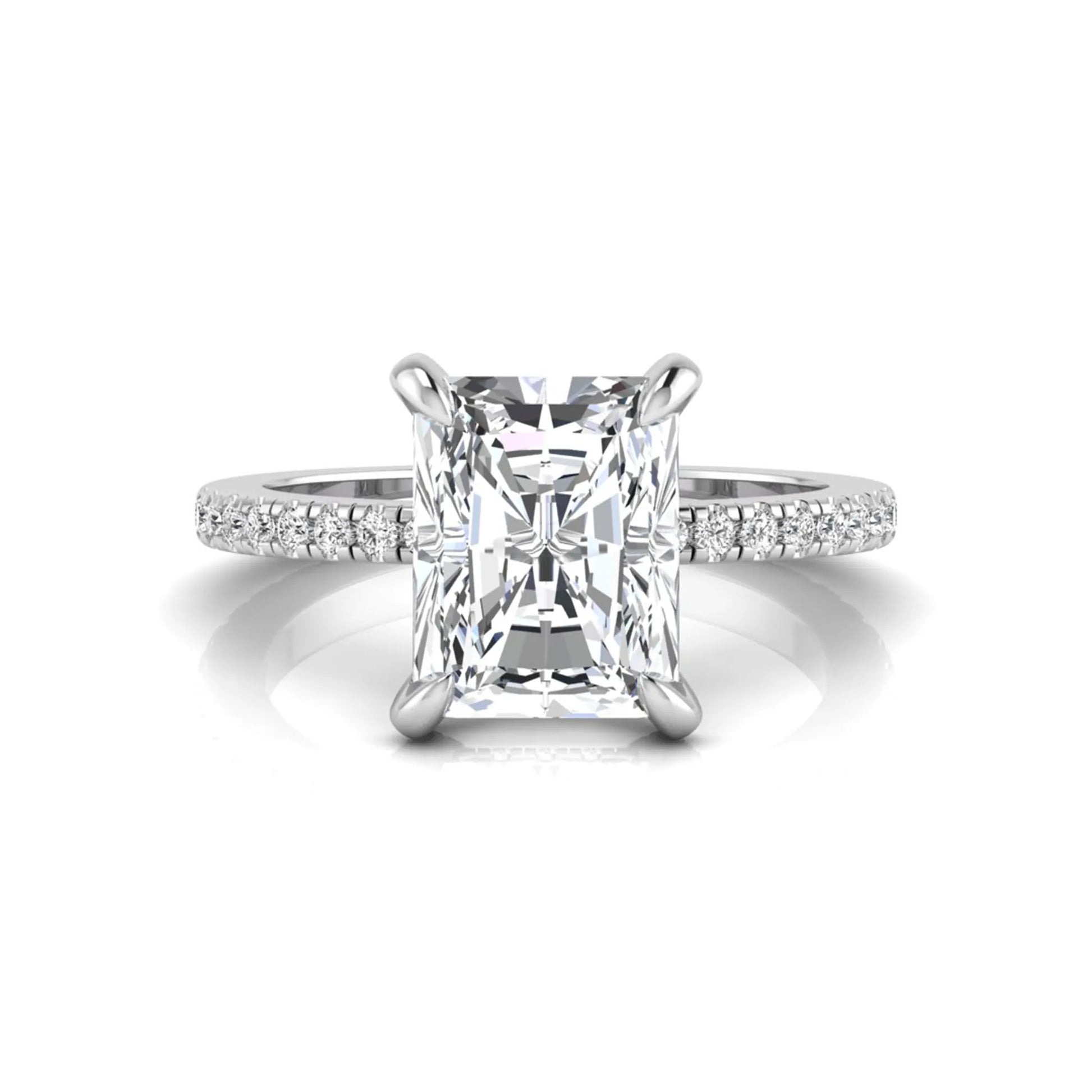 Radiant cut lab grown diamond solitaire engagement ring with hidden halo, pavé band, and white gold metal tone.