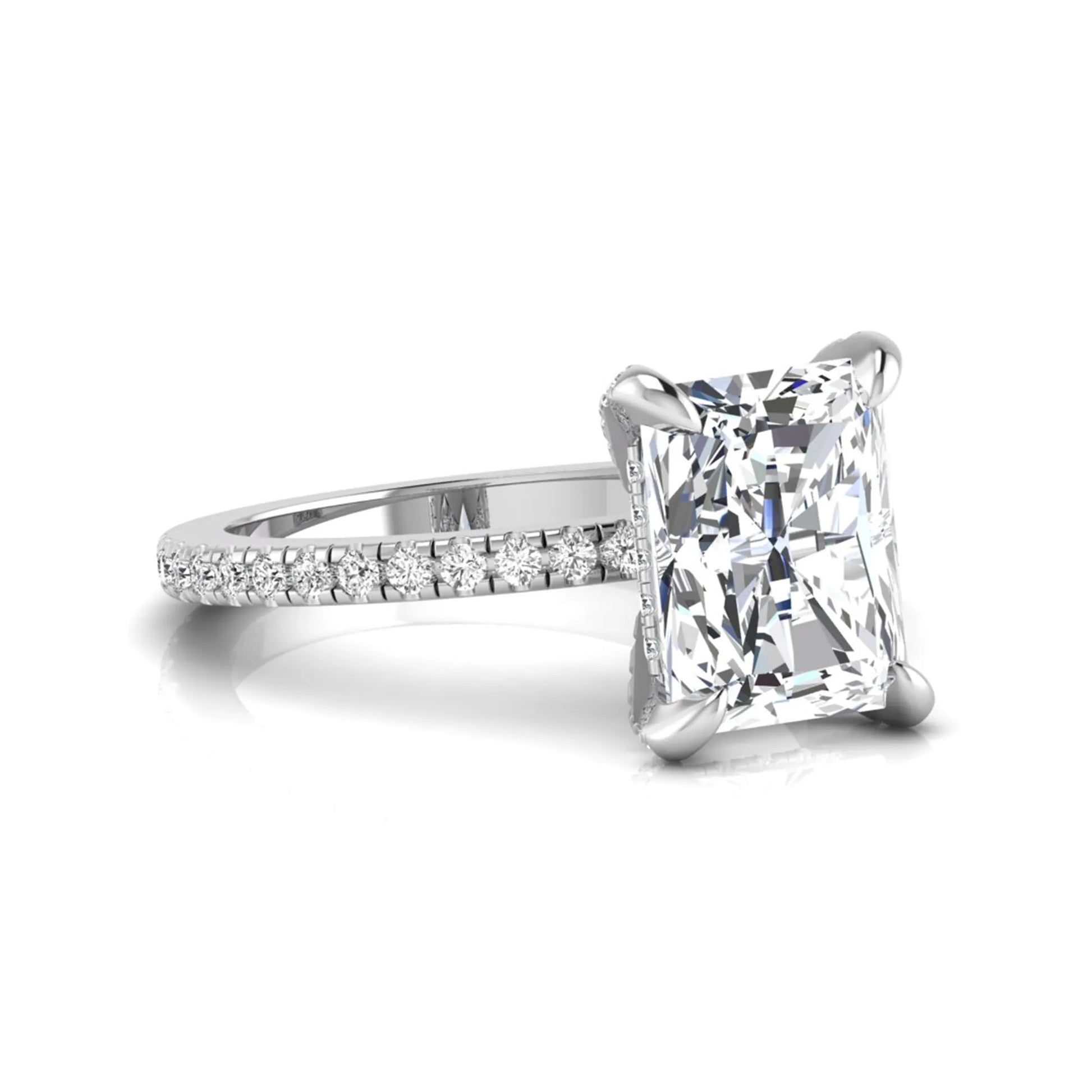 Radiant cut lab grown diamond solitaire engagement ring with hidden halo, pavé band, and white gold metal tone.