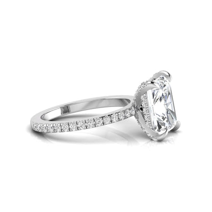 Radiant cut lab grown diamond solitaire engagement ring with hidden halo, pavé band, and white gold metal tone.