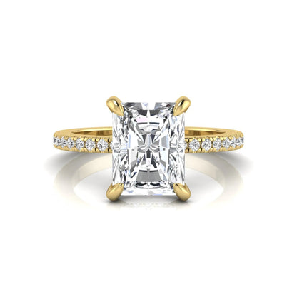 Radiant cut lab grown diamond solitaire engagement ring with hidden halo, pavé band, and yellow gold metal tone.