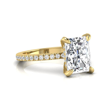Radiant cut lab grown diamond solitaire engagement ring with hidden halo, pavé band, and yellow gold metal tone.