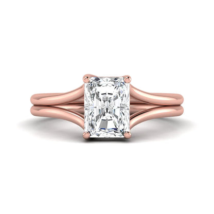 Radiant cut lab grown diamond solitaire engagement ring featuring a split shank band with a four-prong setting in polished rose gold.
