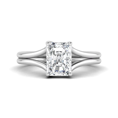 Radiant cut lab grown diamond solitaire engagement ring featuring a split shank band with a four-prong setting in polished white gold.