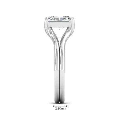 Radiant cut lab grown diamond solitaire engagement ring featuring a split shank band with a four-prong setting in polished white gold.