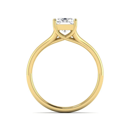 Radiant cut lab grown diamond solitaire engagement ring featuring a split shank band with a four-prong setting in polished yellow gold.