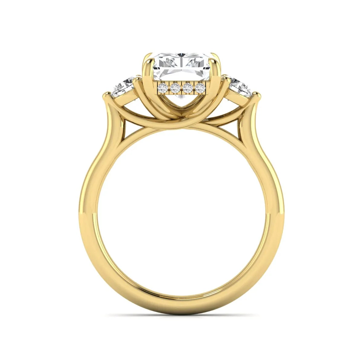 Radiant cut lab grown diamond three stone engagement ring with round side diamonds in a four-prong setting and yellow gold tone band.