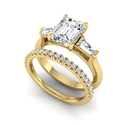 Radiant cut lab grown diamond bridal ring set featuring baguette side diamonds and a pavé diamond wedding band in yellow gold tone design.