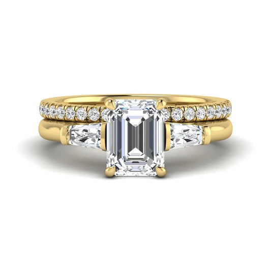 Radiant cut lab grown diamond bridal ring set featuring baguette side diamonds and a pavé diamond wedding band in yellow gold tone design.