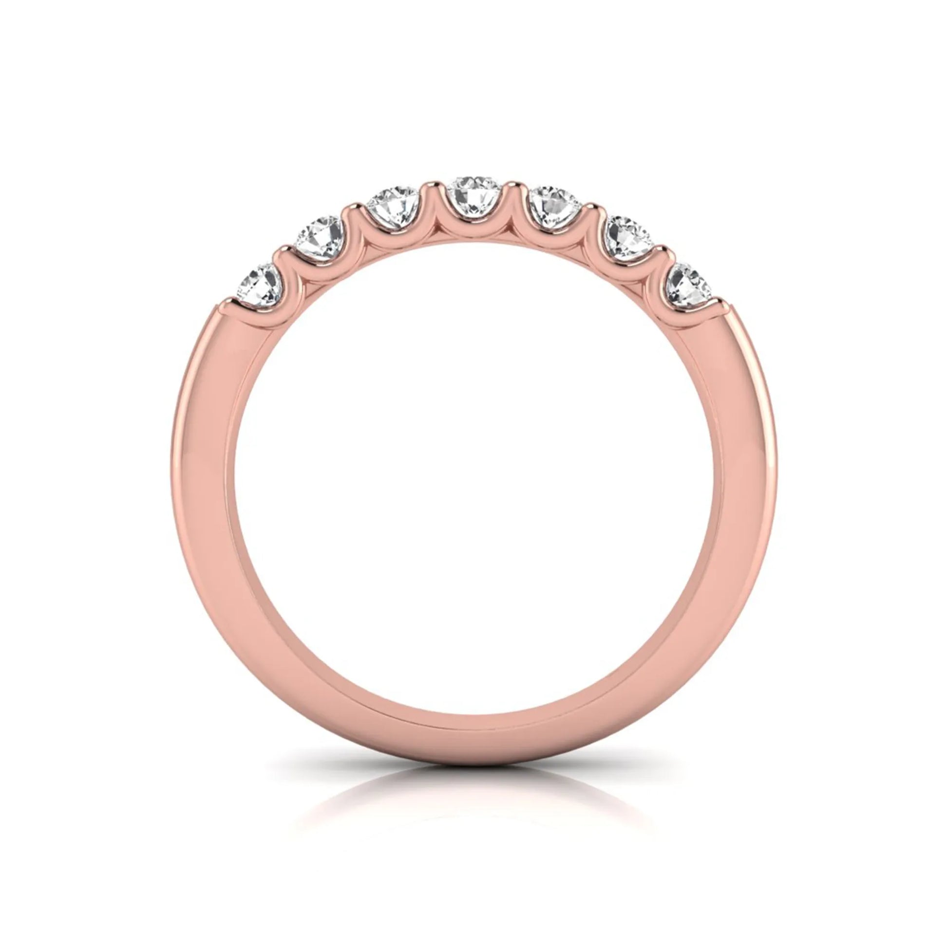 Rose-gold ring with small diamonds on a white background