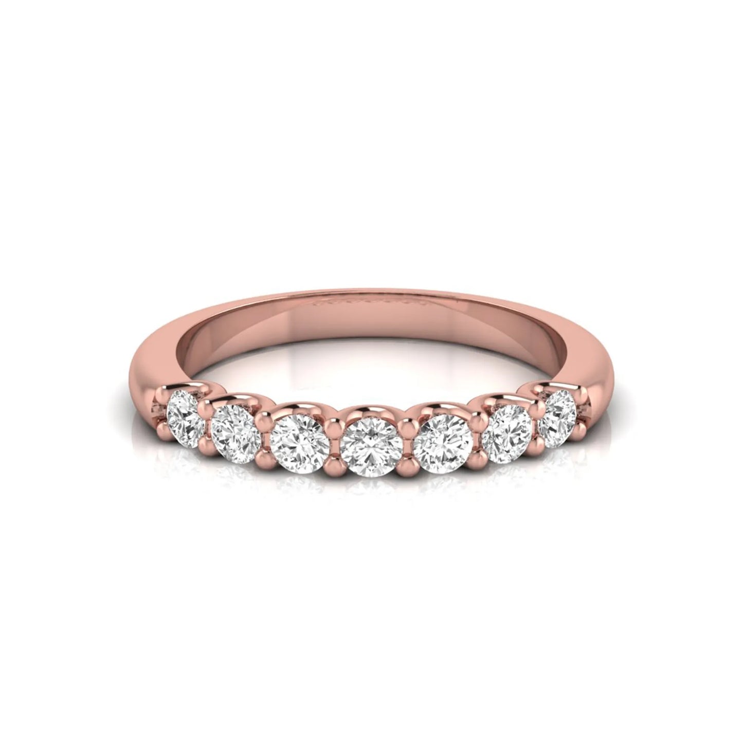 Rose-gold ring with diamonds on a white background