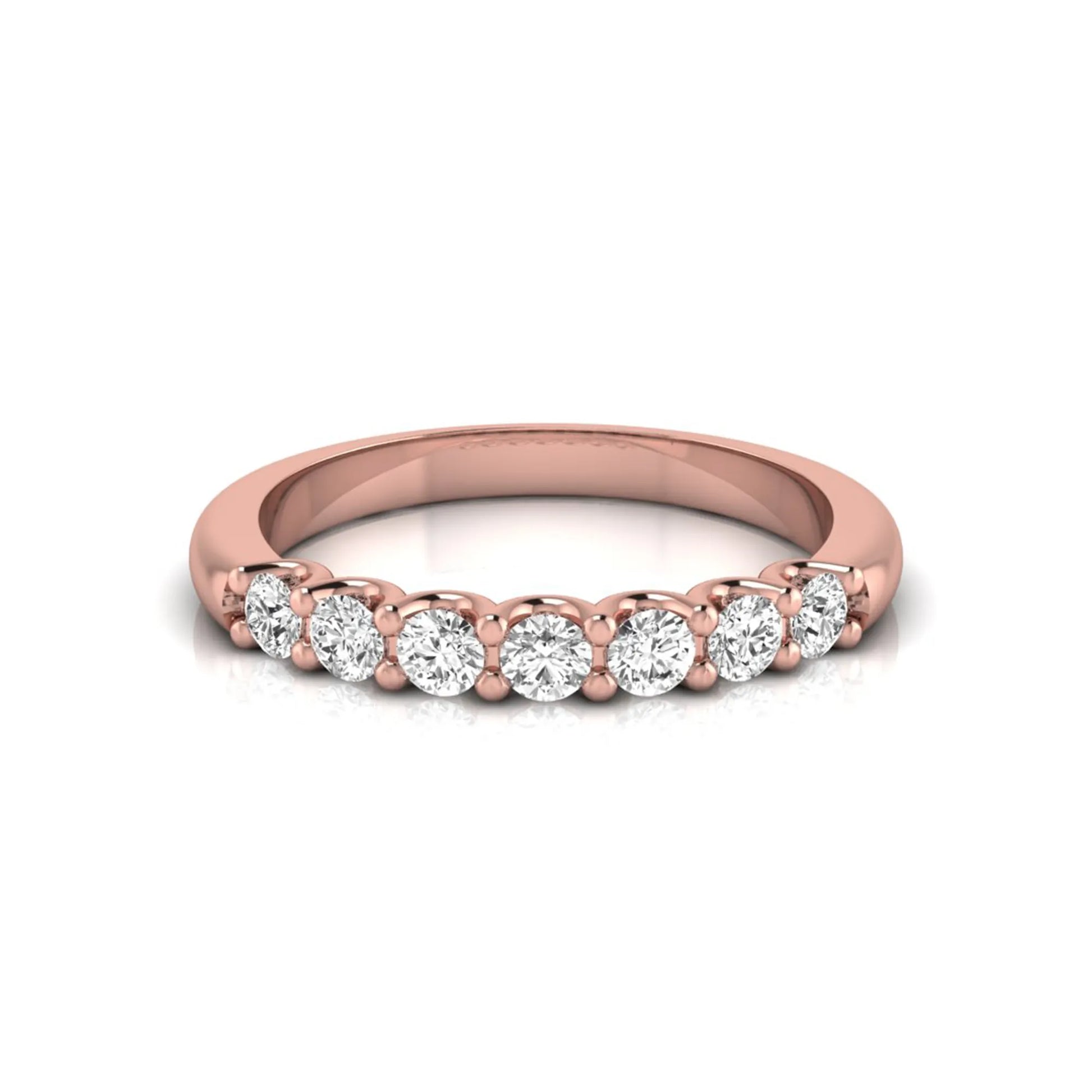 Rose-gold ring with diamonds on a white background