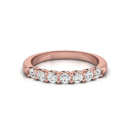 Rose-gold ring with diamonds on a white background