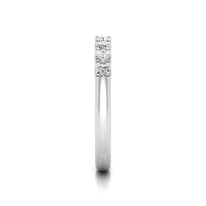white-gold ring with small diamonds on a white background