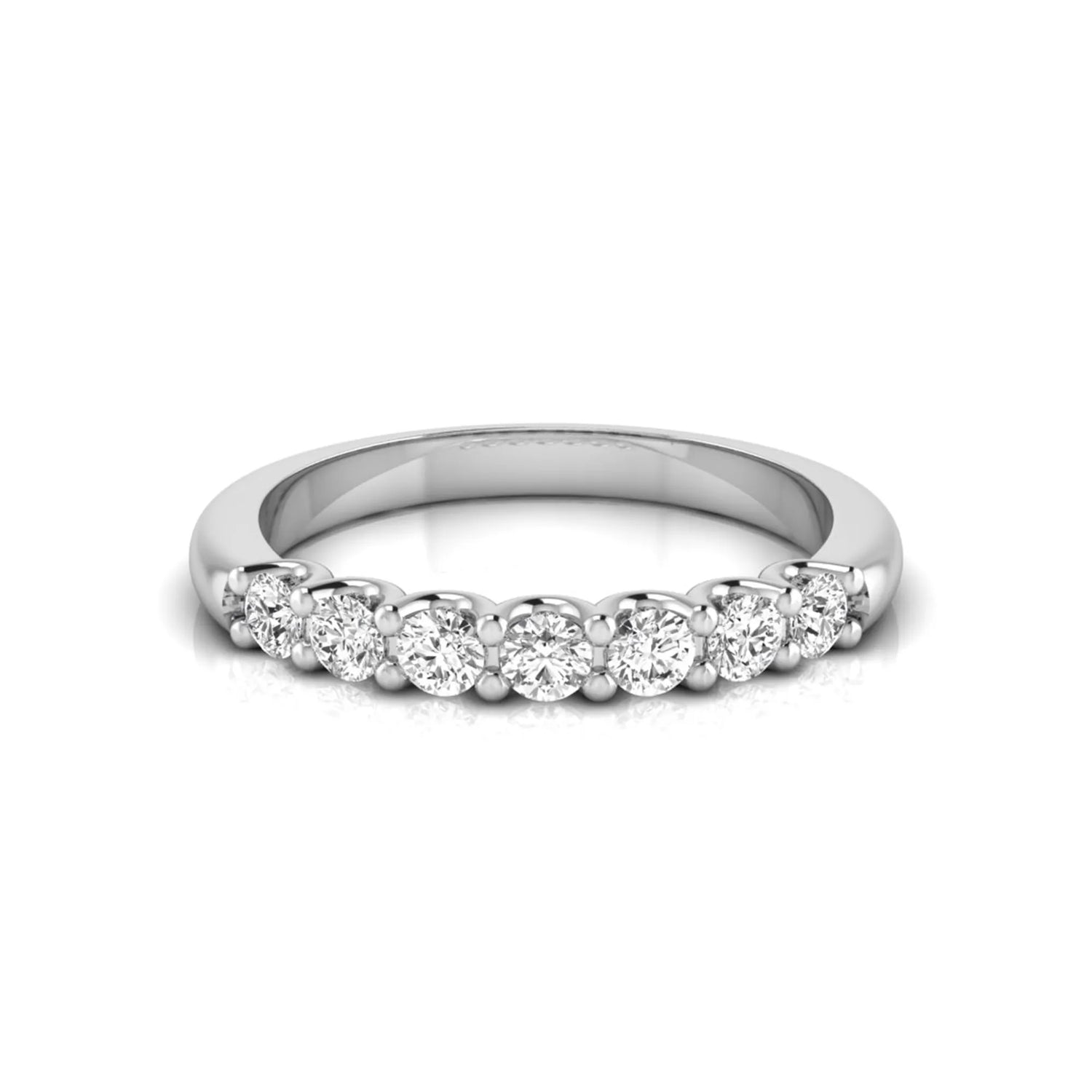 white-gold ring with small diamonds on a white background