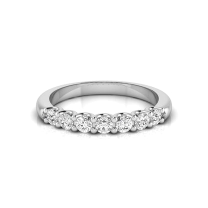 white-gold ring with small diamonds on a white background
