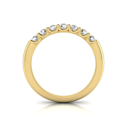 yellow-Gold ring with small diamonds on a white background
