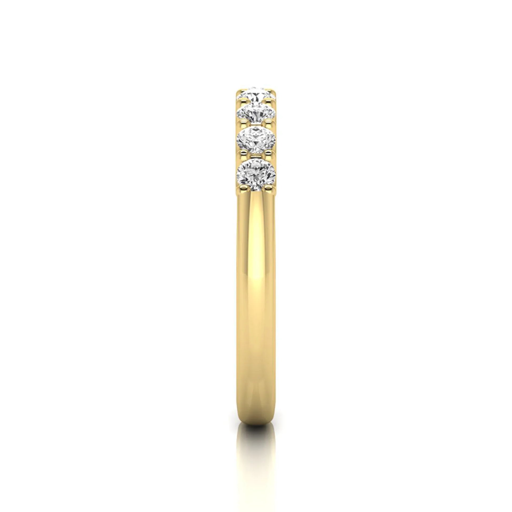 yellow-Gold ring with three diamonds on a white background