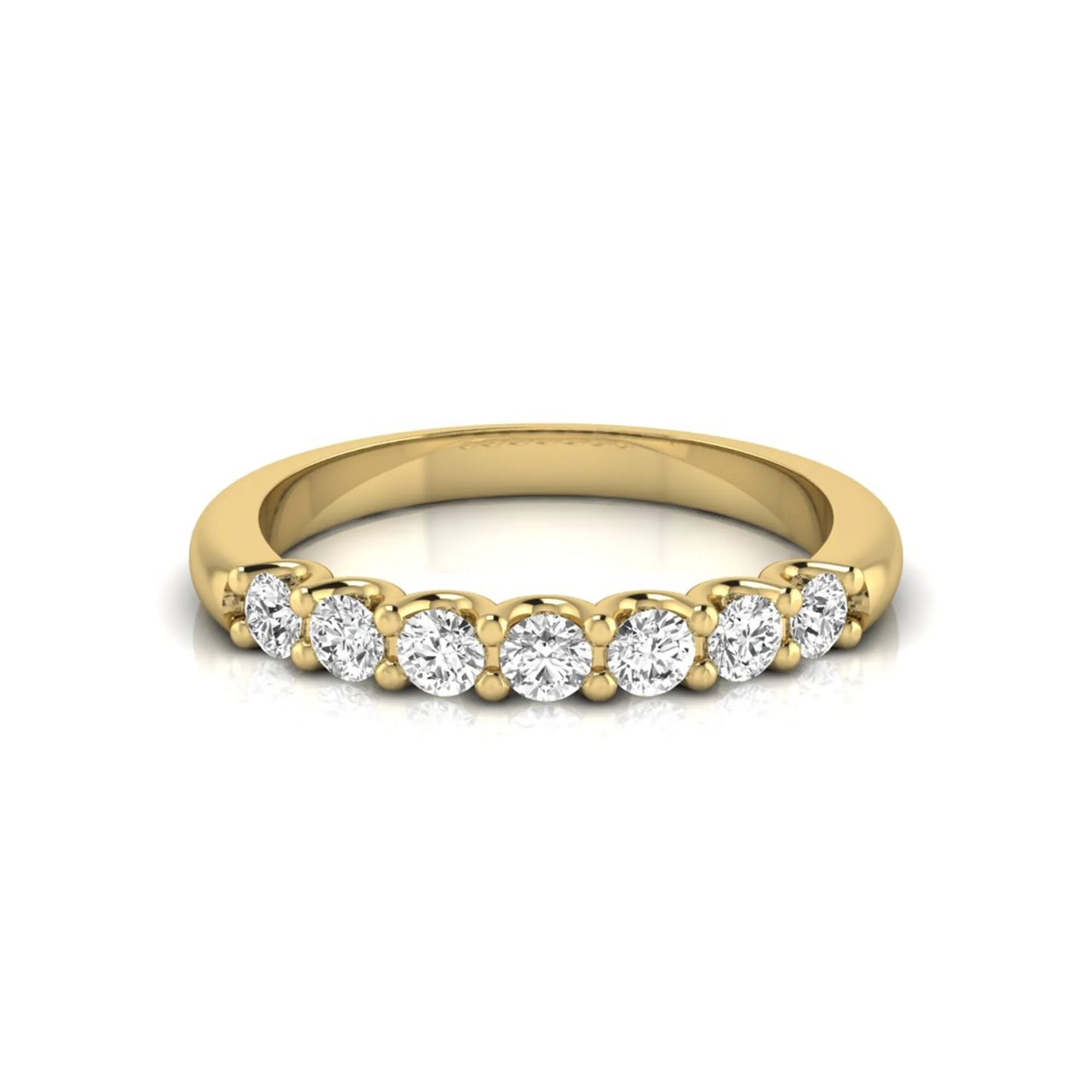 yellow-Gold ring with diamonds on a white background