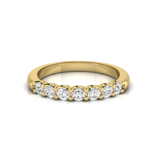 yellow-Gold ring with diamonds on a white background