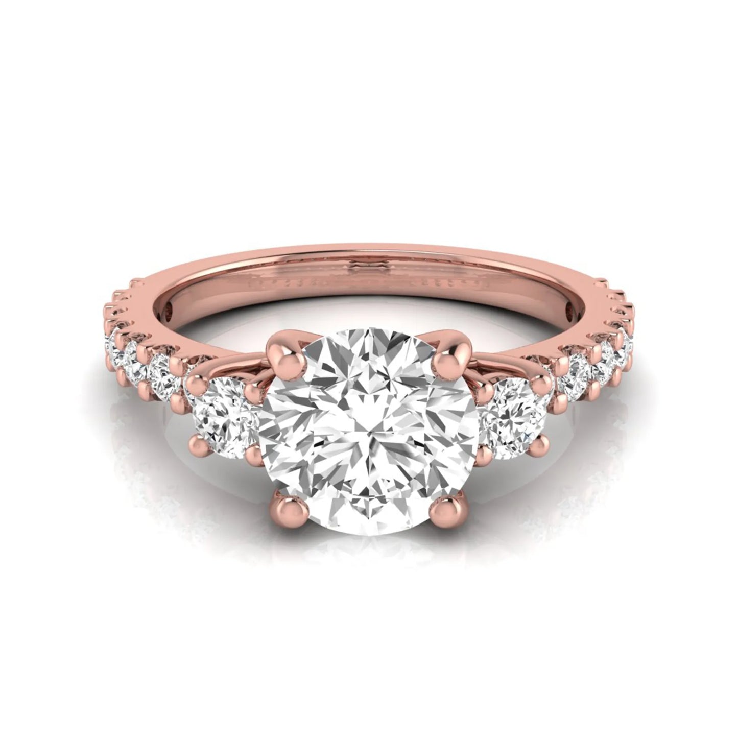 Round Accent Lab Grown Diamond Engagement Ring featuring a 7.5 mm round center diamond with round accent diamonds in a classic prong setting in rose gold