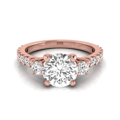 Round Accent Lab Grown Diamond Engagement Ring featuring a 7.5 mm round center diamond with round accent diamonds in a classic prong setting in rose gold