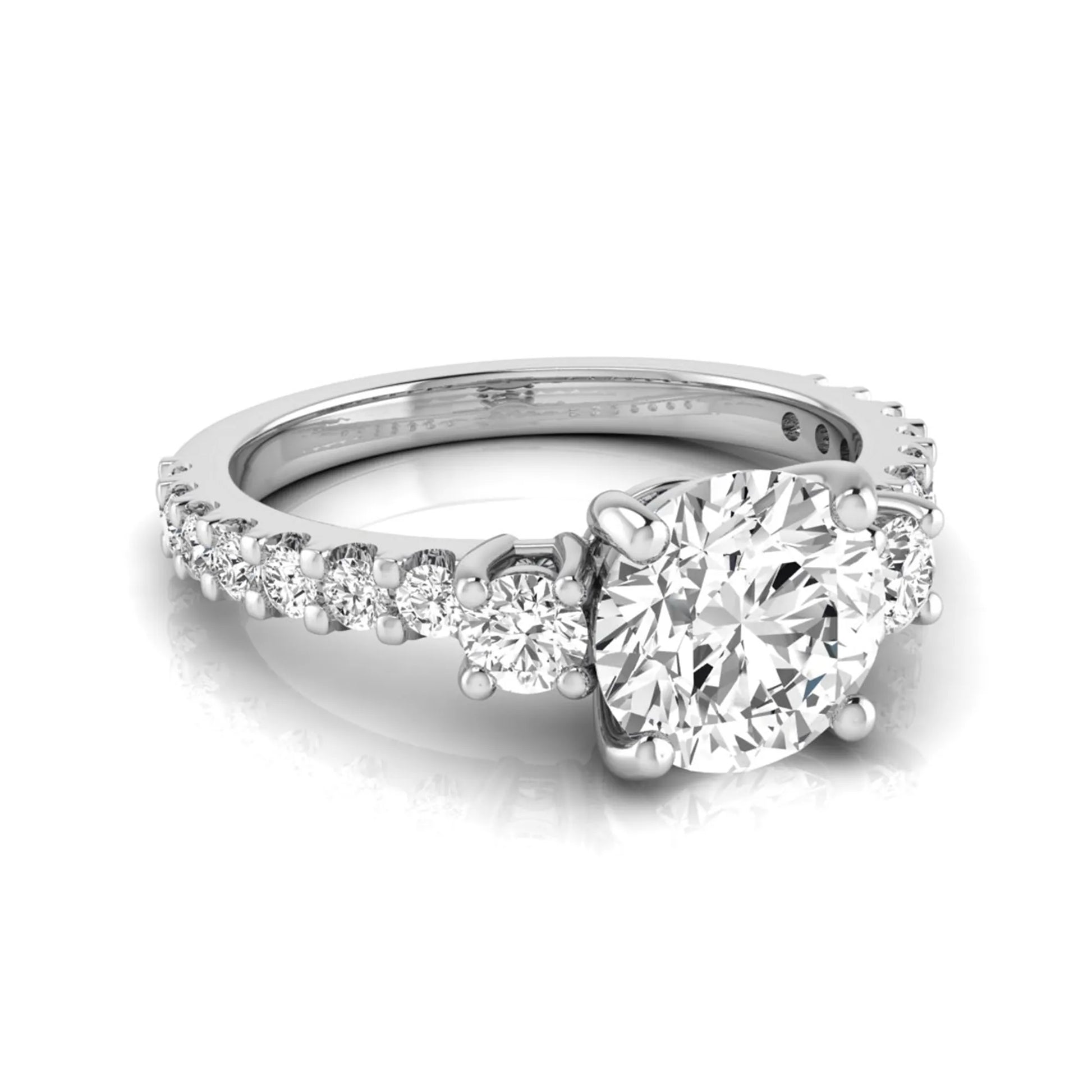 Round Accent Lab Grown Diamond Engagement Ring featuring a 7.5 mm round center diamond with round accent diamonds in a classic prong setting in white gold