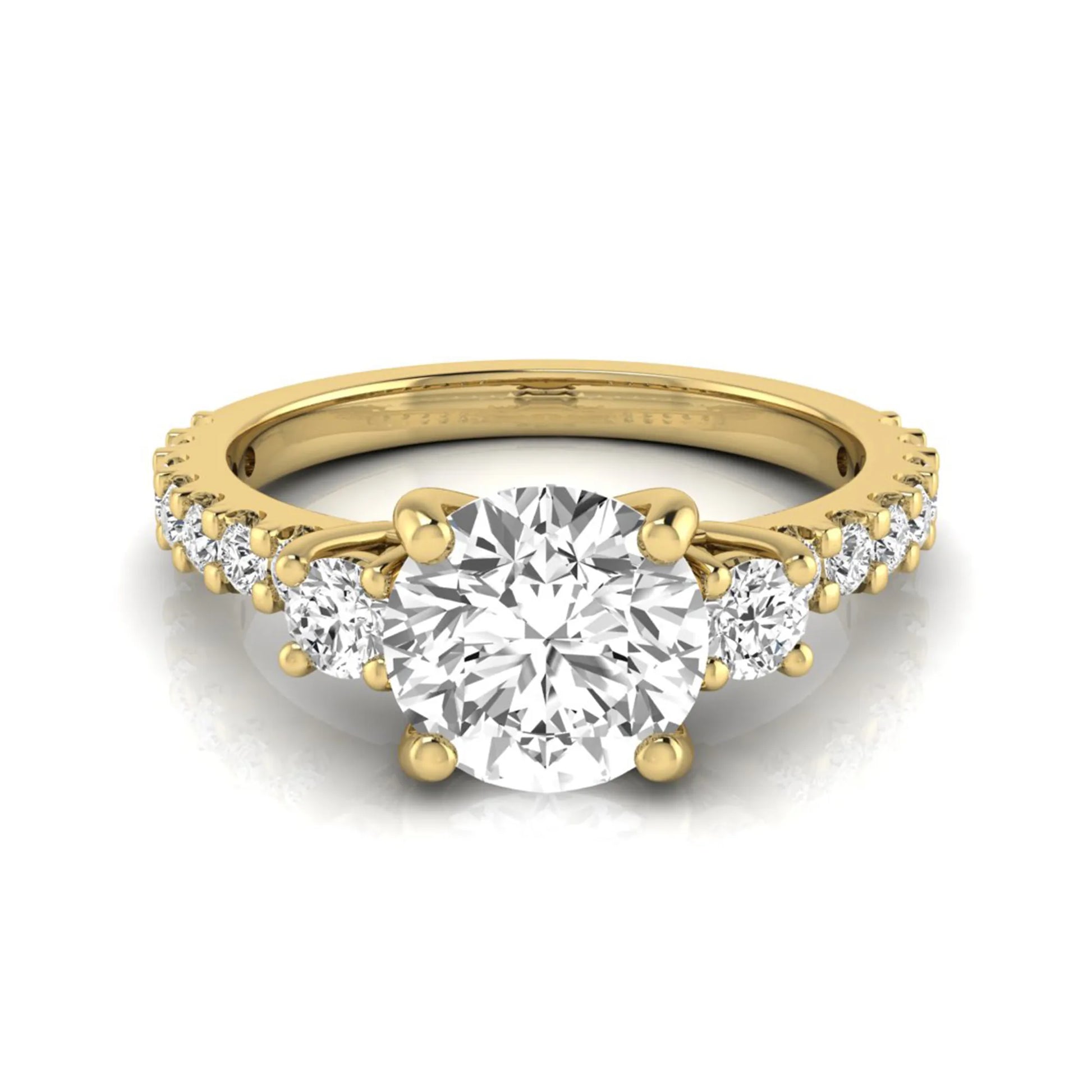 Round Accent Lab Grown Diamond Engagement Ring featuring a 7.5 mm round center diamond with round accent diamonds in a classic prong setting in yellow gold