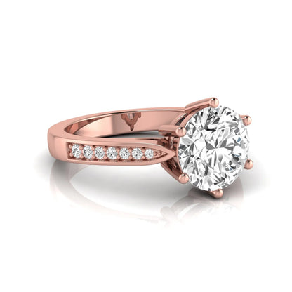 Round cut lab grown diamond engagement ring featuring a six-prong setting with round accent diamonds on a tapered rose gold style band.