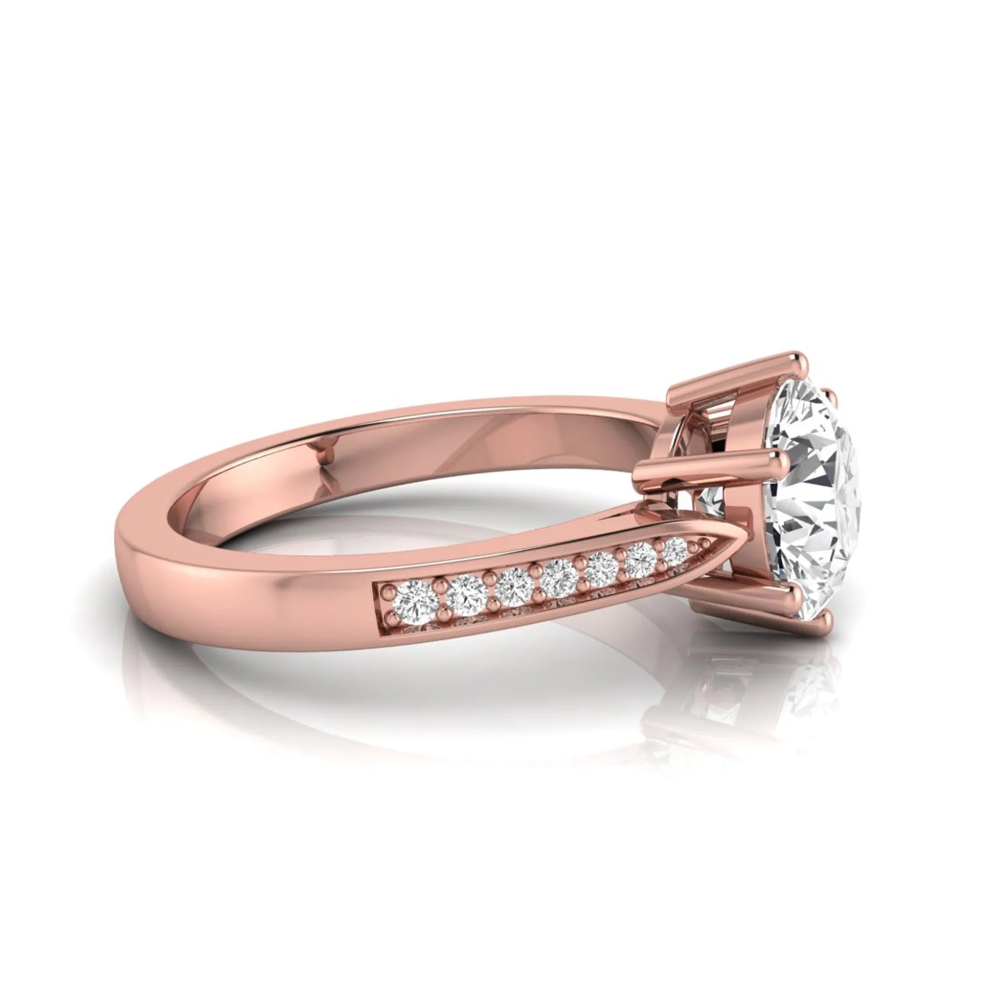 Round cut lab grown diamond engagement ring featuring a six-prong setting with round accent diamonds on a tapered rose gold style band.