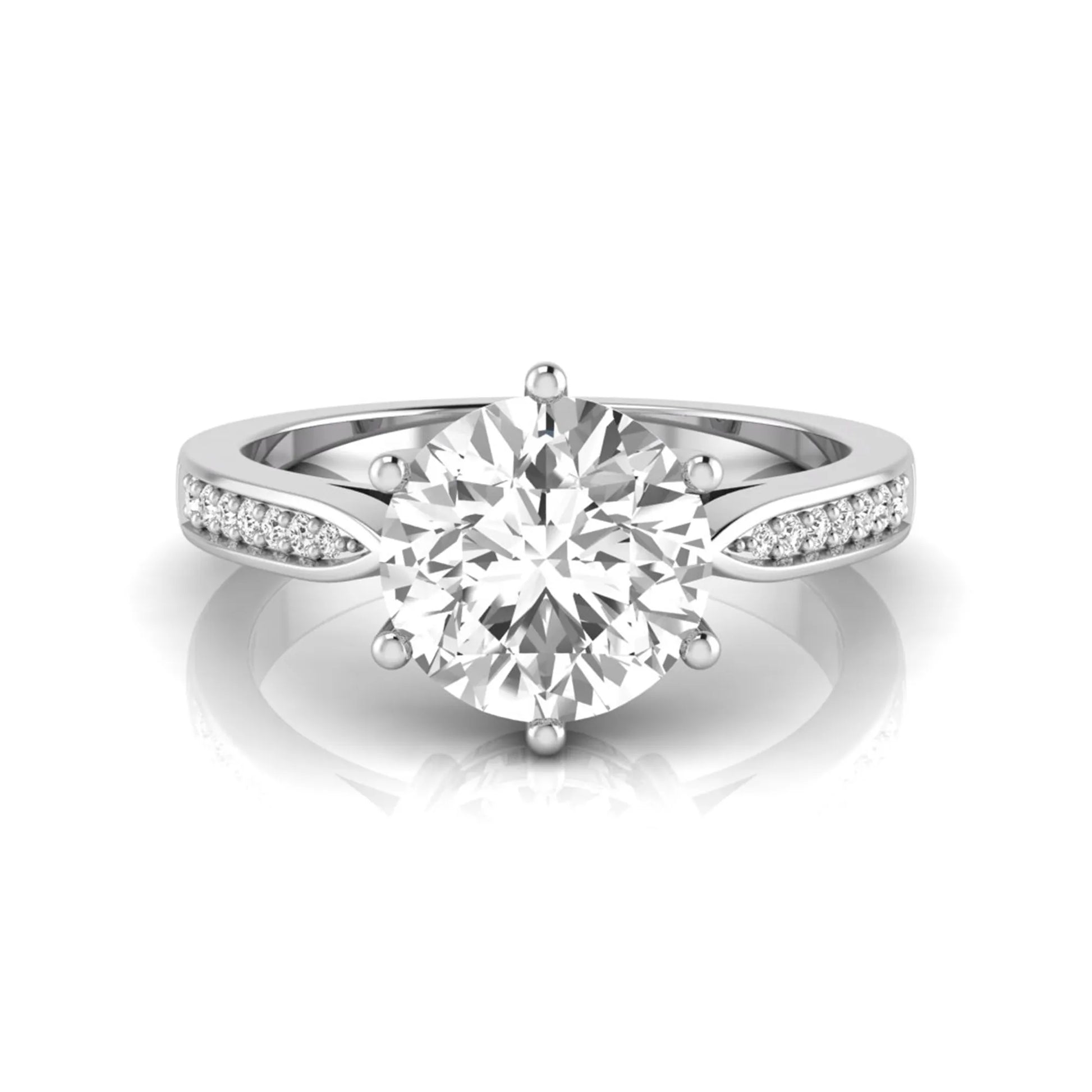 Round cut lab grown diamond engagement ring featuring a six-prong setting with round accent diamonds on a tapered white gold style band.