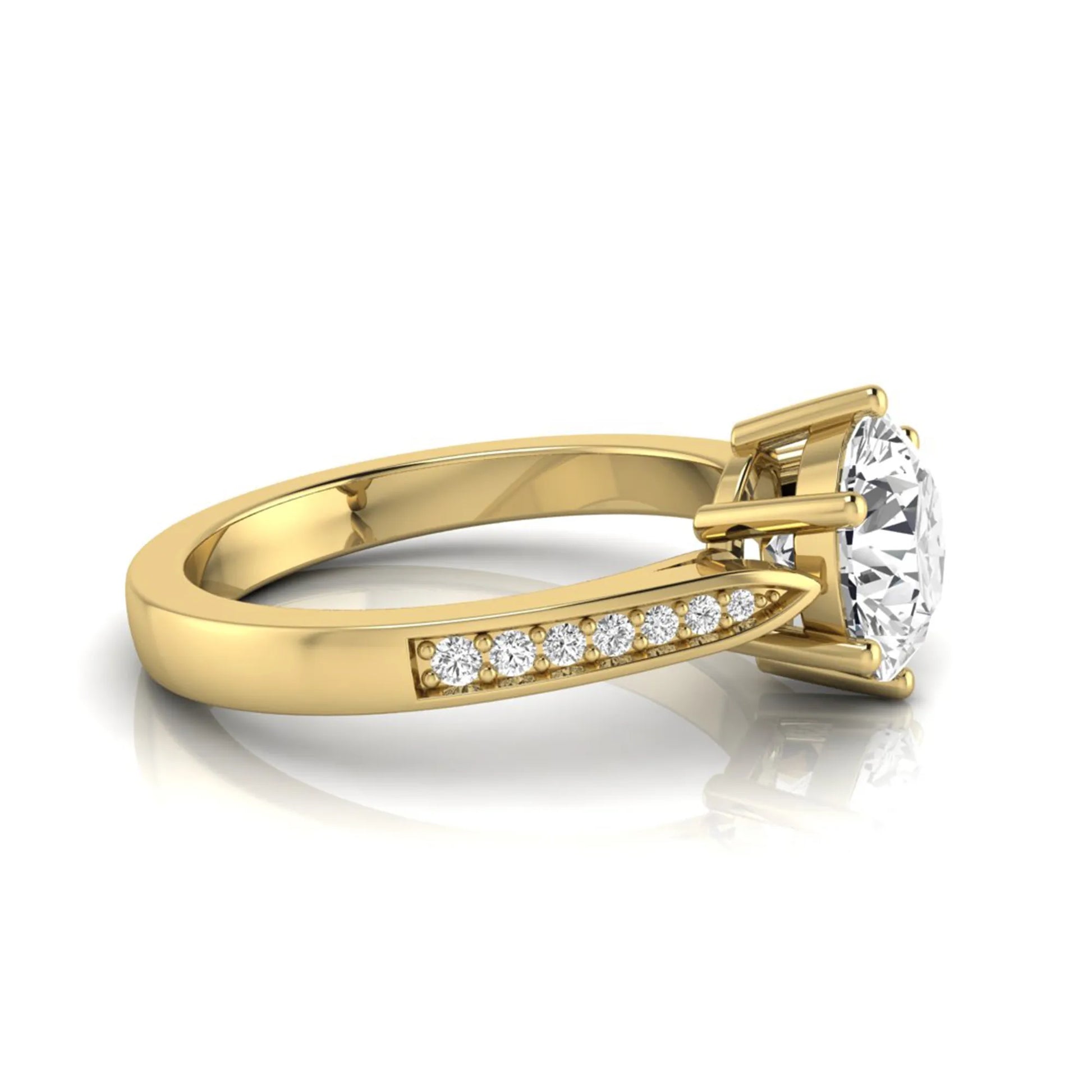 Round cut lab grown diamond engagement ring featuring a six-prong setting with round accent diamonds on a tapered yellow gold style band.