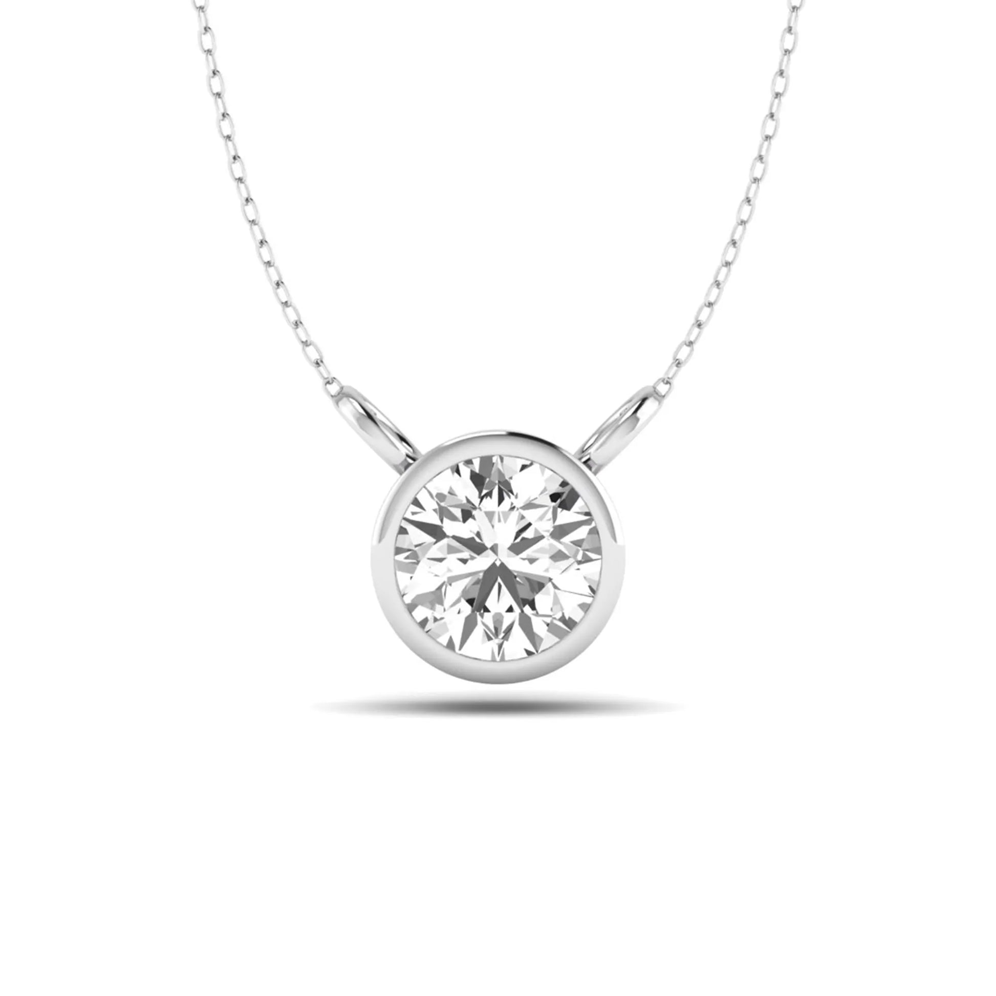Round brilliant lab grown diamond solitaire pendant necklace with a classic bezel setting in a white gold  metal finish.