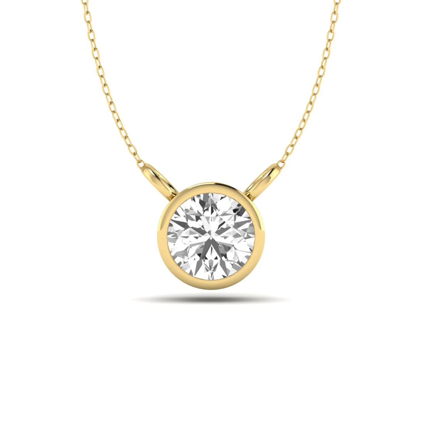 Round brilliant lab grown diamond solitaire pendant necklace with a classic bezel setting in a yellow gold  metal finish.