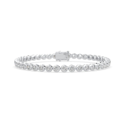 white gold Round brilliant lab grown diamond tennis bracelet with bezel settings and a secure box clasp with double safety latch.
