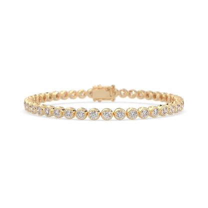 yellow gold Round brilliant lab grown diamond tennis bracelet with bezel settings and a secure box clasp with double safety latch.