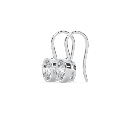 white gold Round bezel set lab grown diamond drop earrings with 6.50 mm IGI certified round diamonds and elegant French wire hook closure.