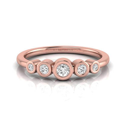 Round bezel set lab grown diamond five stone ring featuring round cut diamonds in a modern graduated design with rose gold finish.