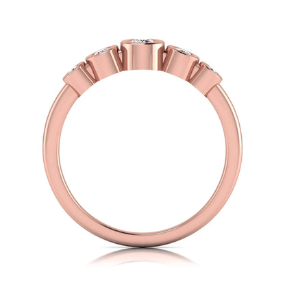Round bezel set lab grown diamond five stone ring featuring round cut diamonds in a modern graduated design with rose gold finish.