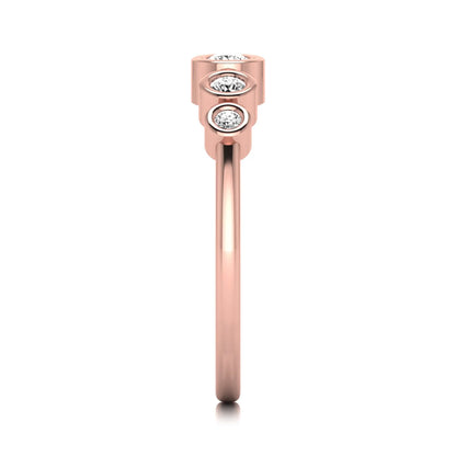 Round bezel set lab grown diamond five stone ring featuring round cut diamonds in a modern graduated design with rose gold finish.