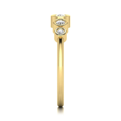 Round bezel set lab grown diamond five stone ring featuring round cut diamonds in a modern graduated design with yellow gold finish.
