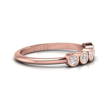 Round bezel set lab grown diamond five stone ring with rose gold tone design