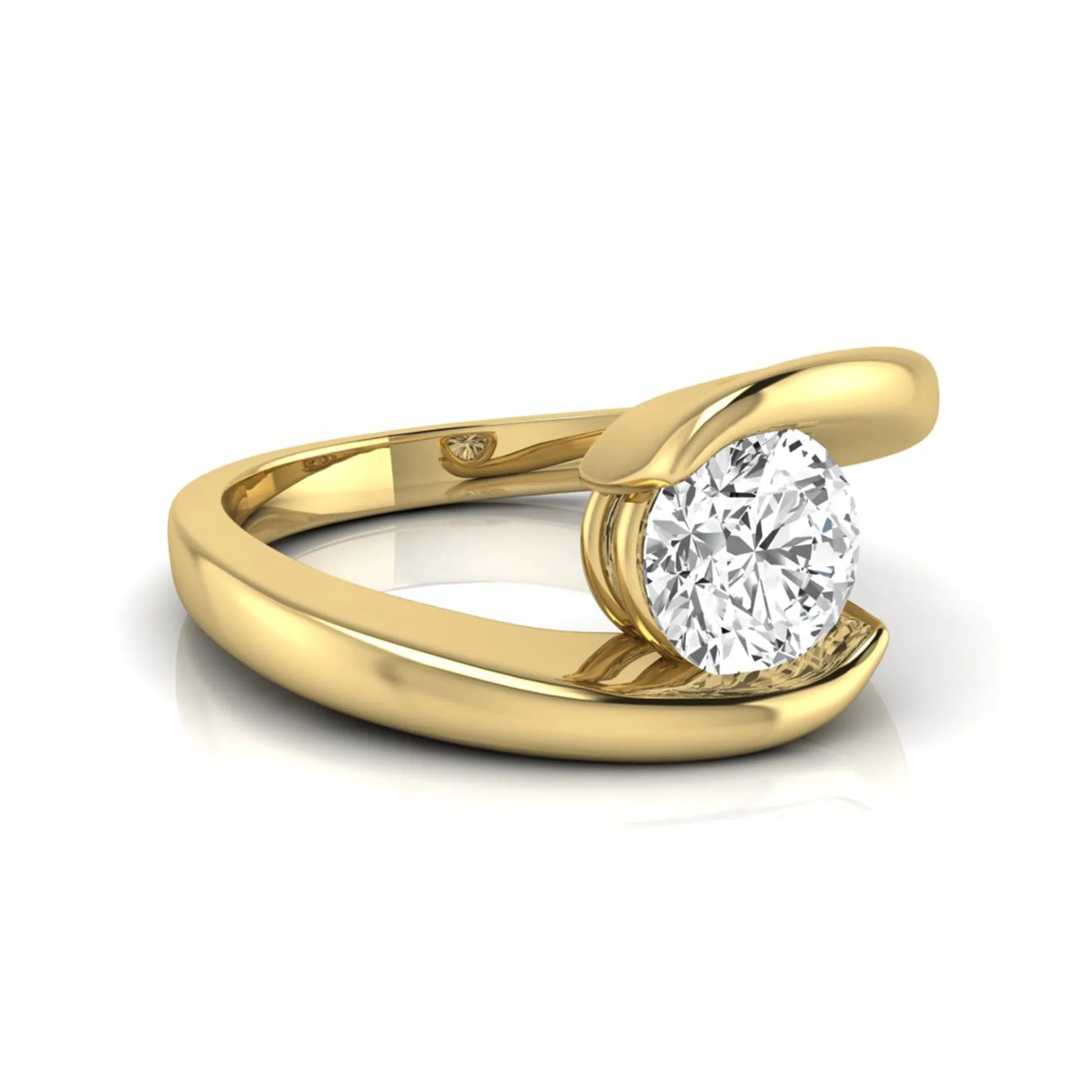 Round cut lab grown diamond solitaire engagement ring featuring a modern bypass yellow gold band with an IGI certified center diamond.