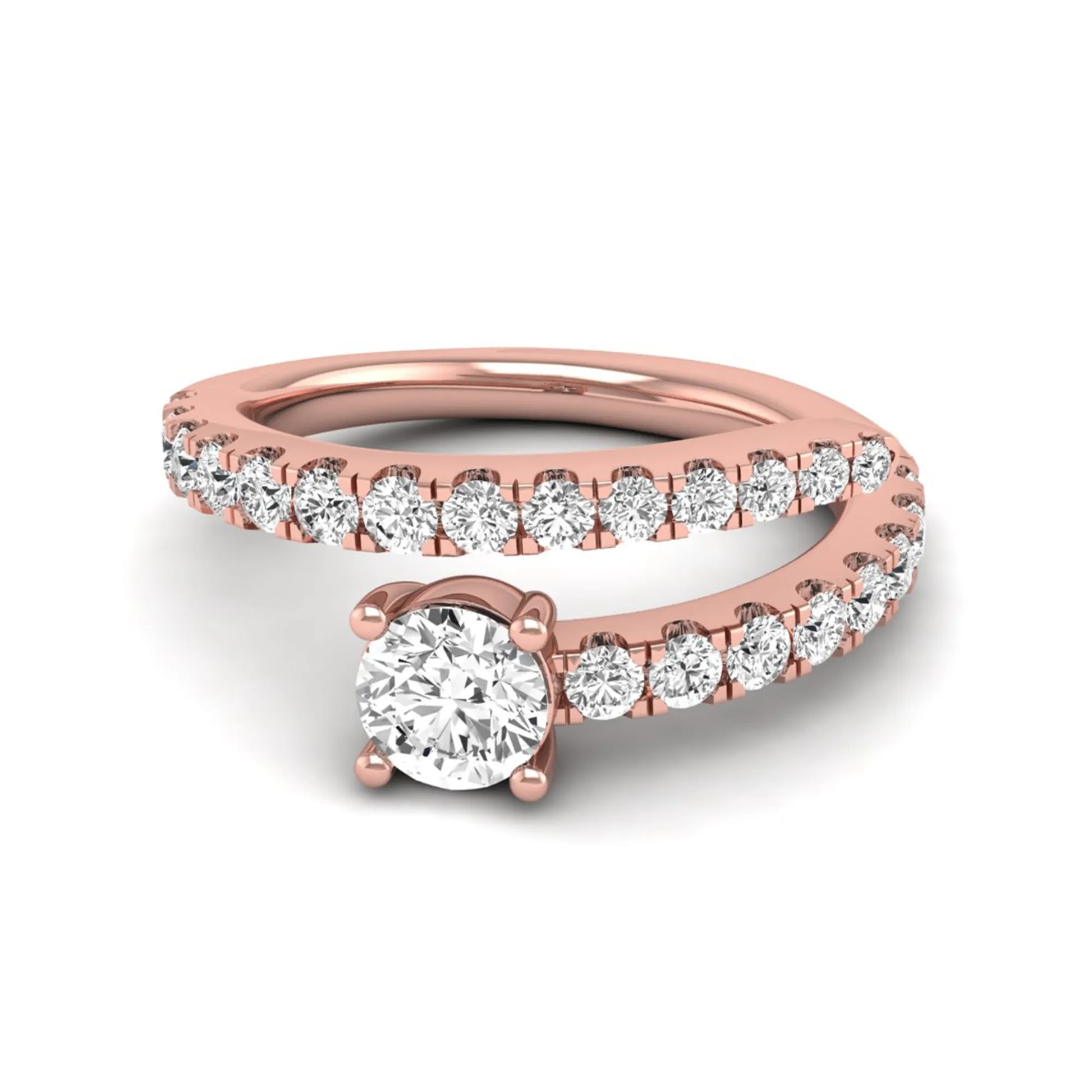 Round cut lab grown diamond bypass engagement ring with round pavé accent diamonds in a four-prong setting in rose gold
